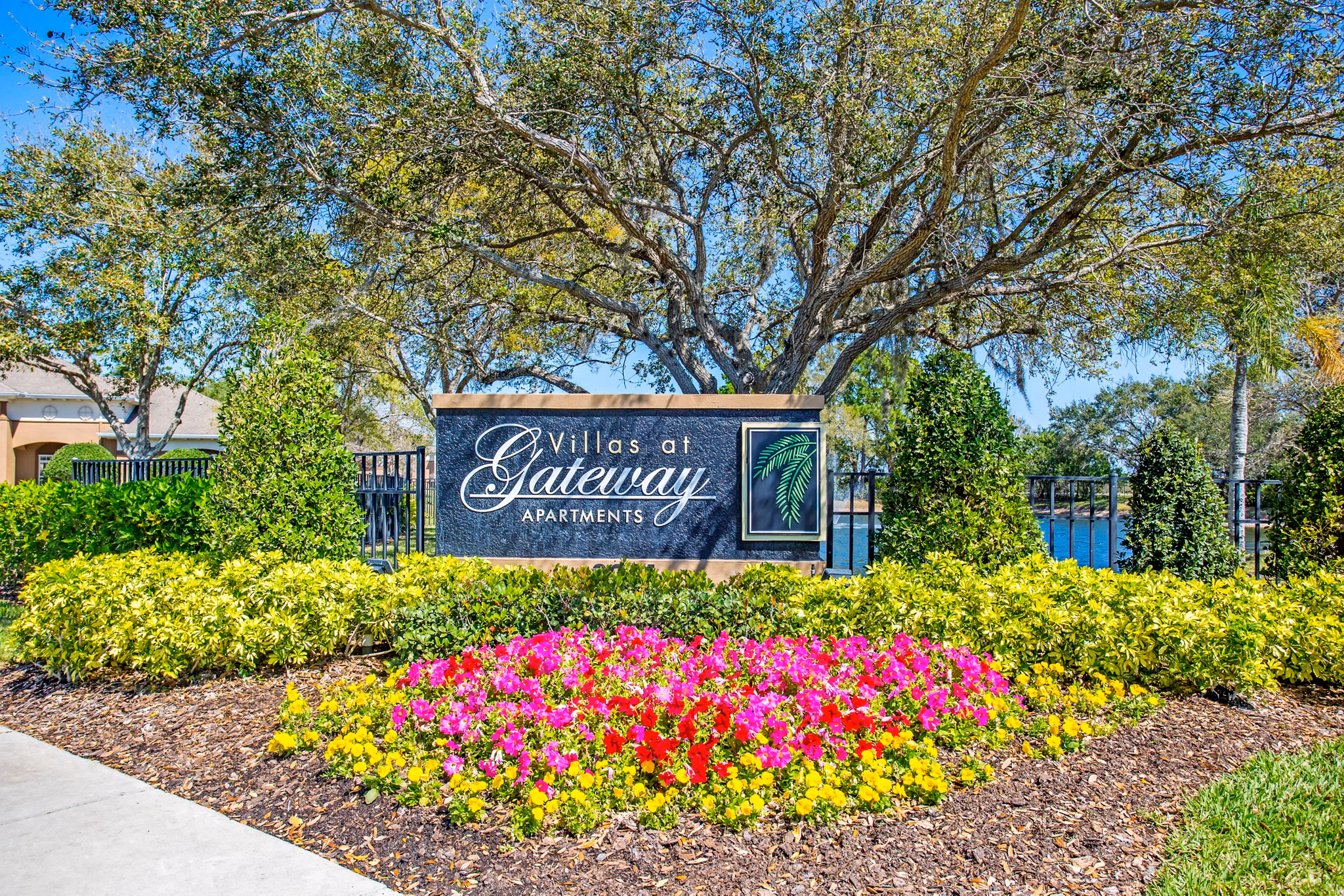 Villas at Gateway Apartments signage with contemporary design, welcoming residents to luxury living