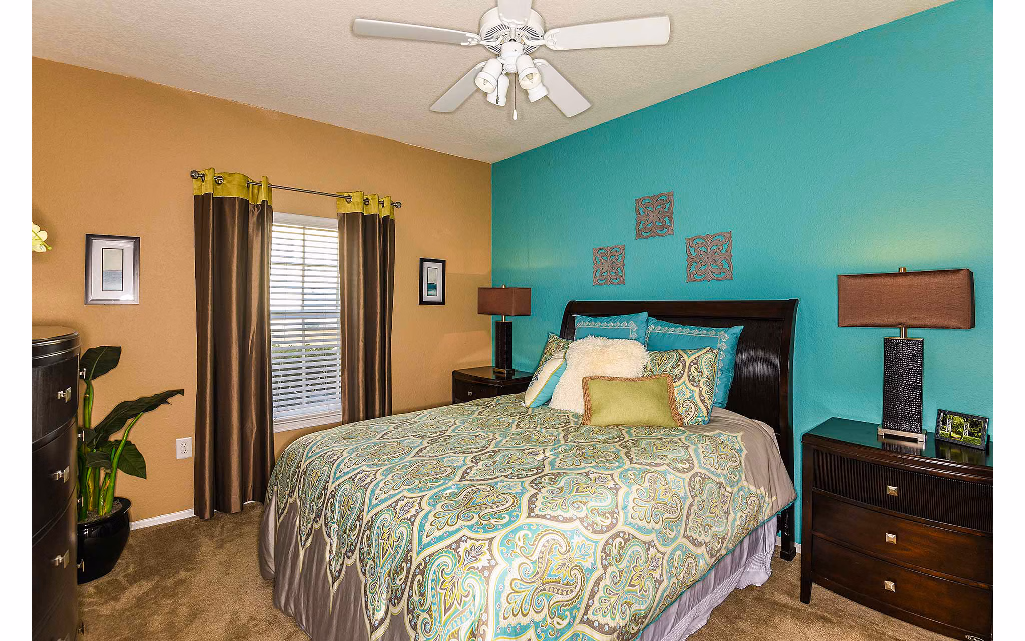 Cozy bedroom with modern decor at Villas at Gateway Apartments