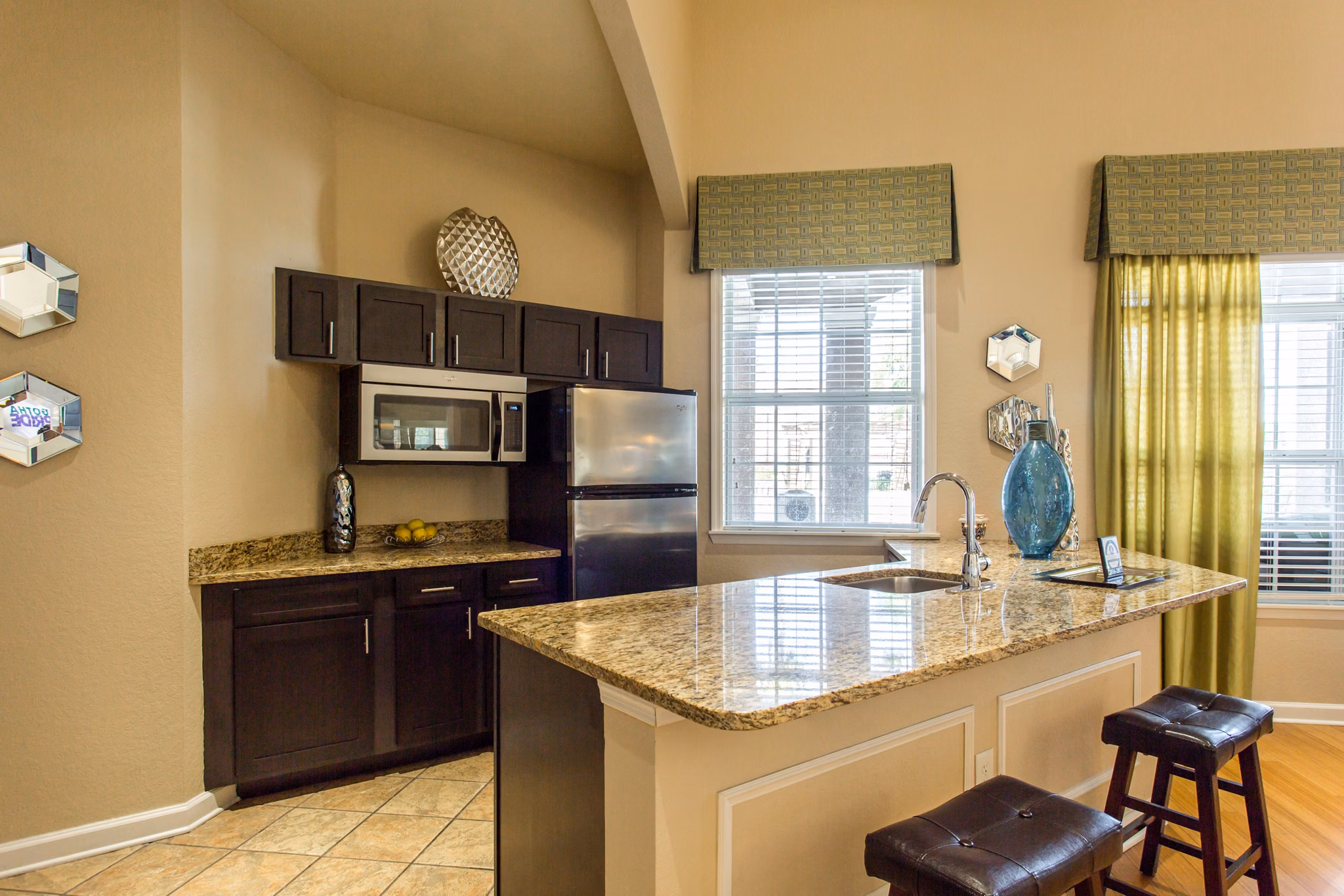 Modern clubhouse featuring a cozy lounge area at Villas at Gateway Apartments
