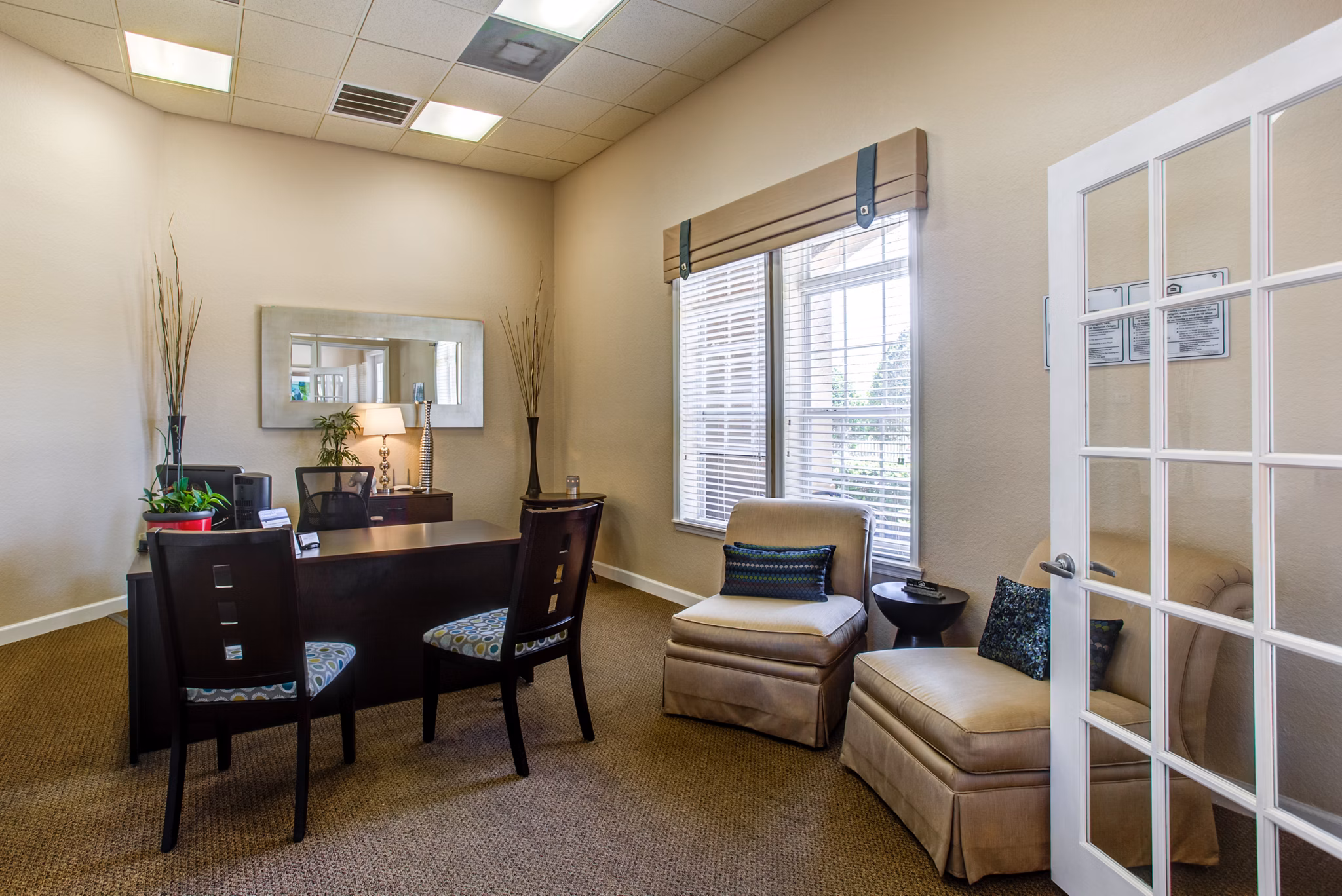 Clubhouse with modern decor and seating at Villas at Gateway Apartments