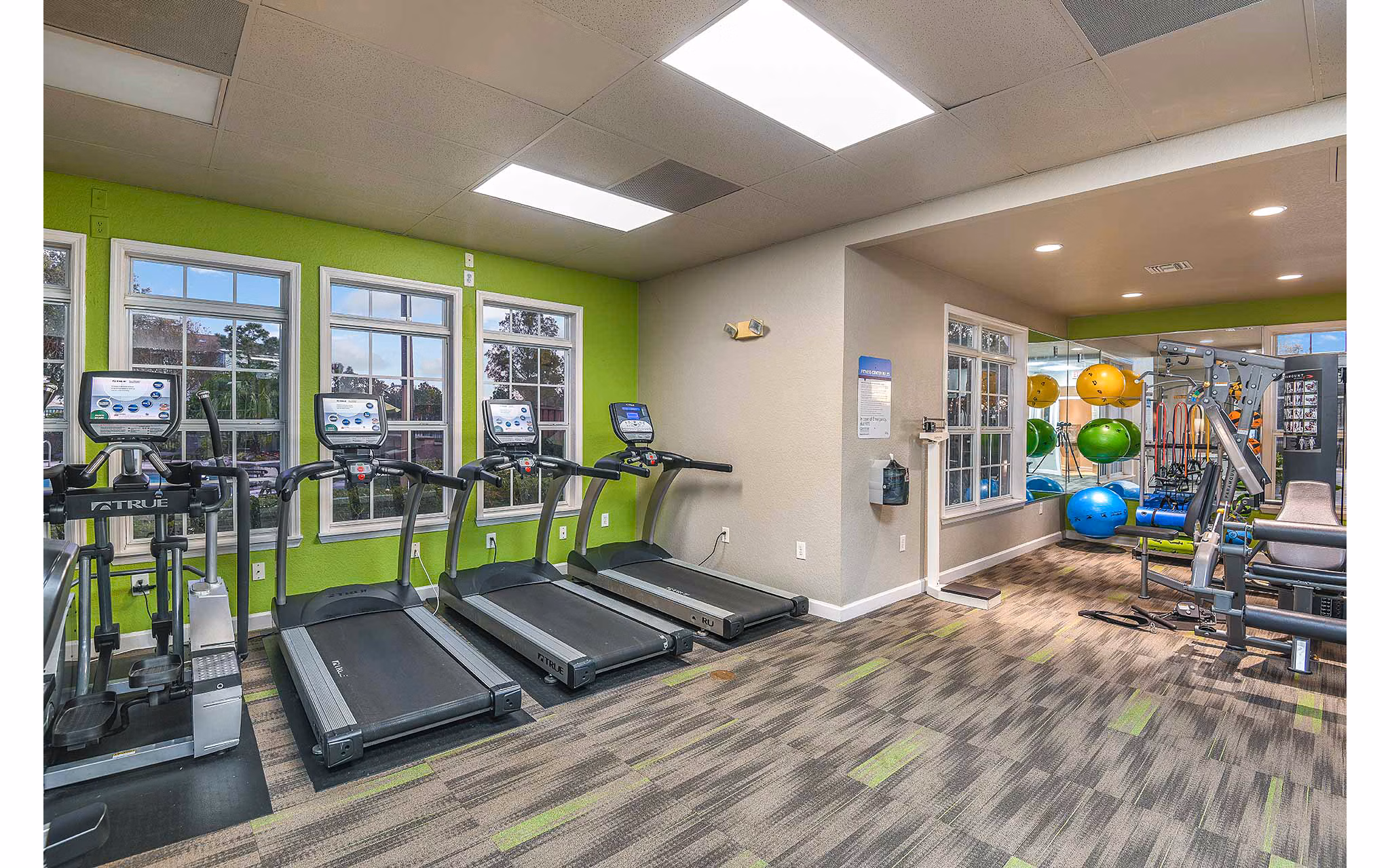 Fitness center with modern equipment at Villas at Gateway Apartments