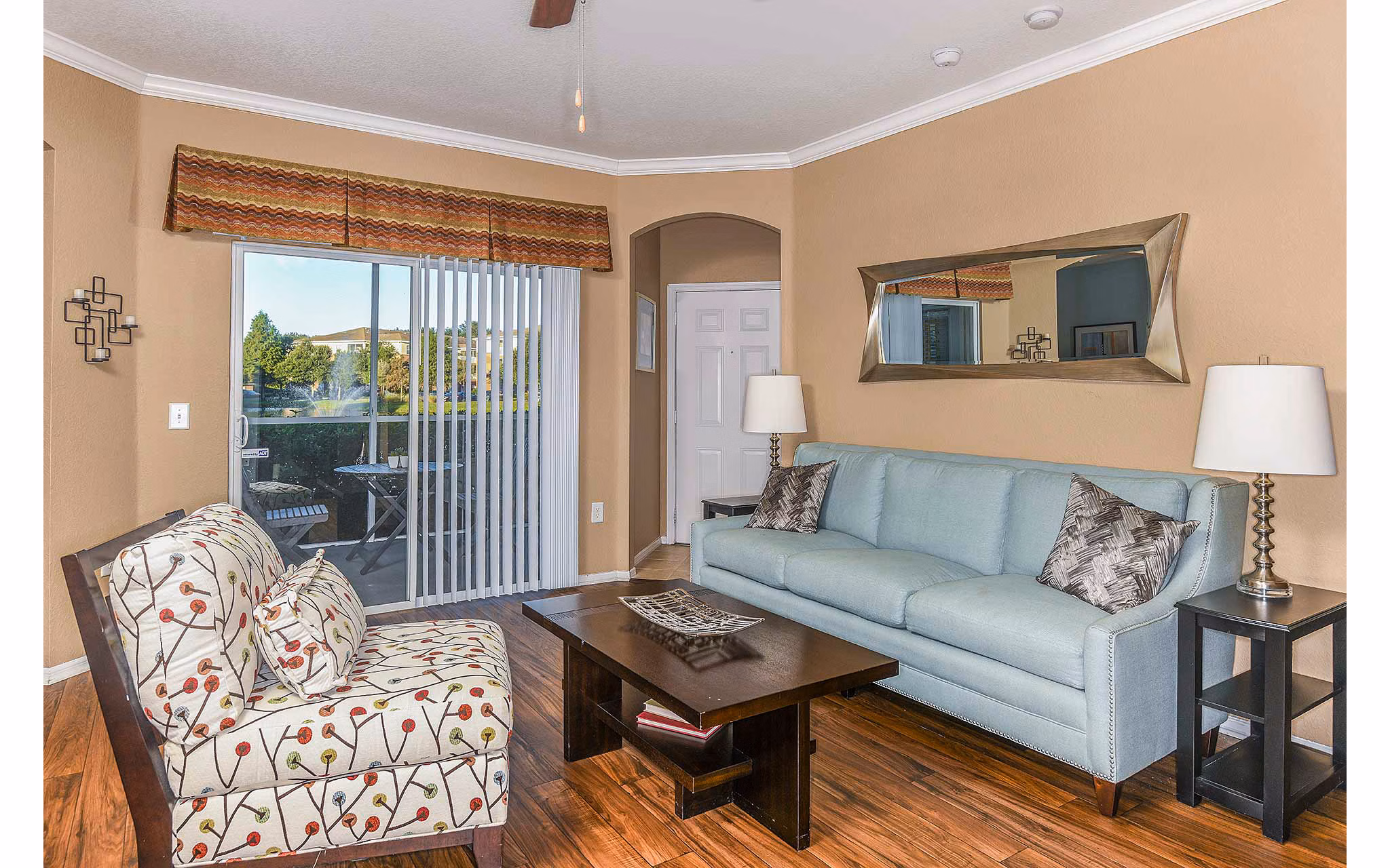 Spacious living room with modern furnishings at Villas at Gateway Apartments