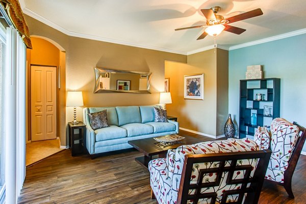 Spacious living room with modern decor at Villas at Gateway Apartments