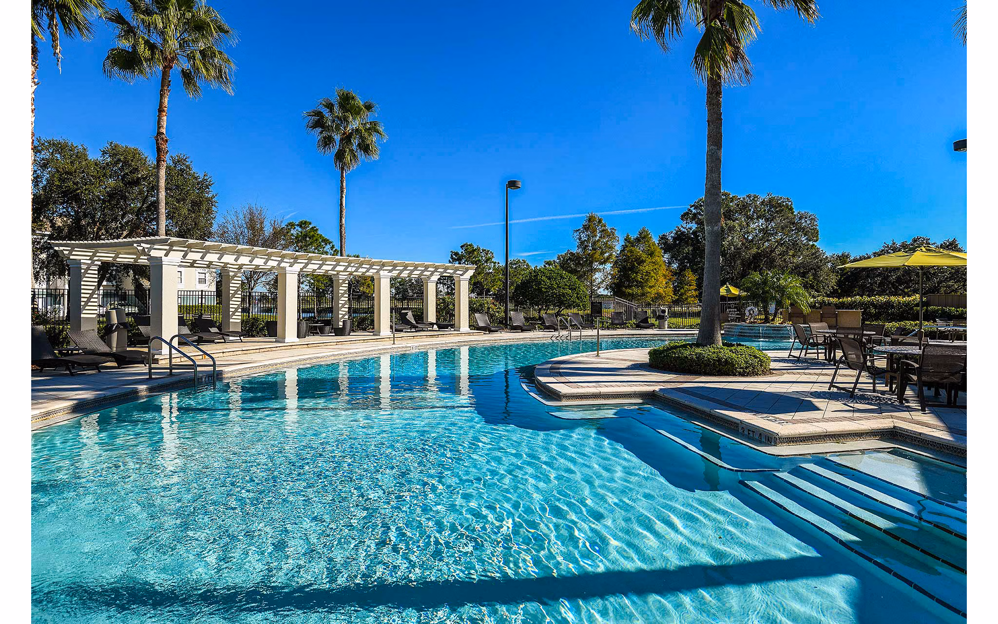 Chic swimming pool at Villas at Gateway Apartments, offering a luxurious retreat and social space for residents