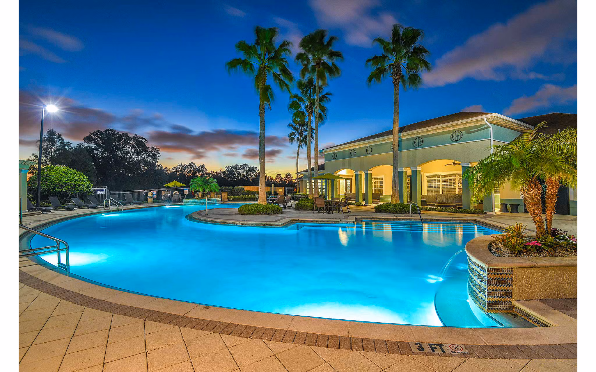 Crystal-clear pool at Villas at Gateway Apartments, perfect for relaxation and outdoor enjoyment