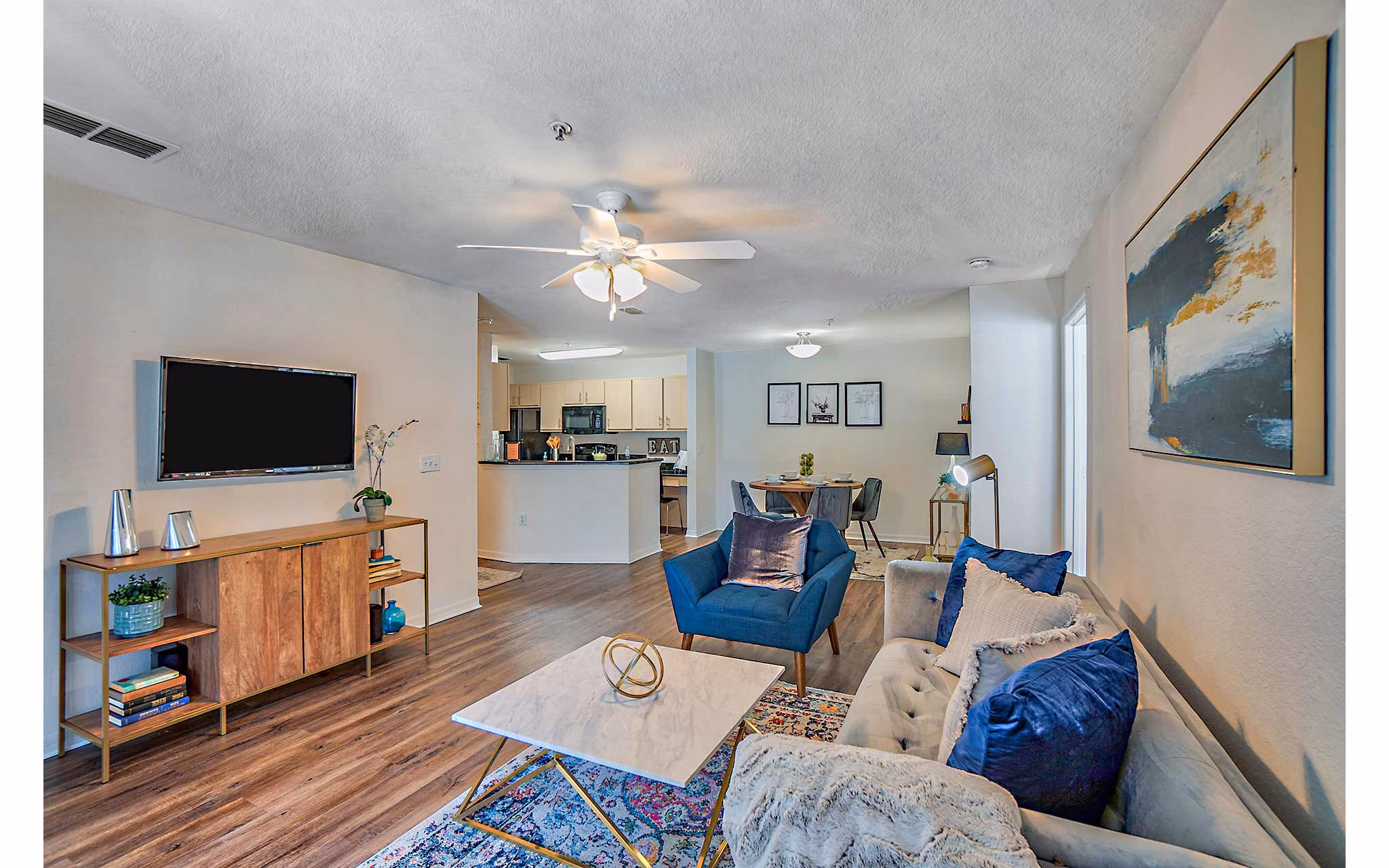 Contemporary living room with stylish decor at Elmhurst Village Apartments