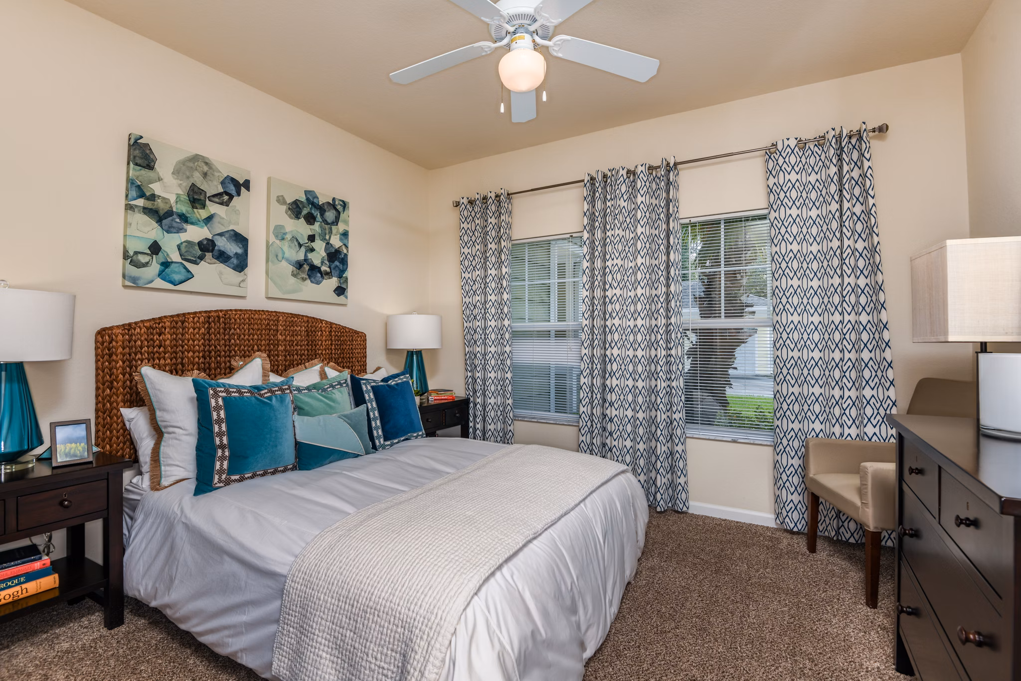 Elegant bedroom with natural light at Arbor Glen Apartments