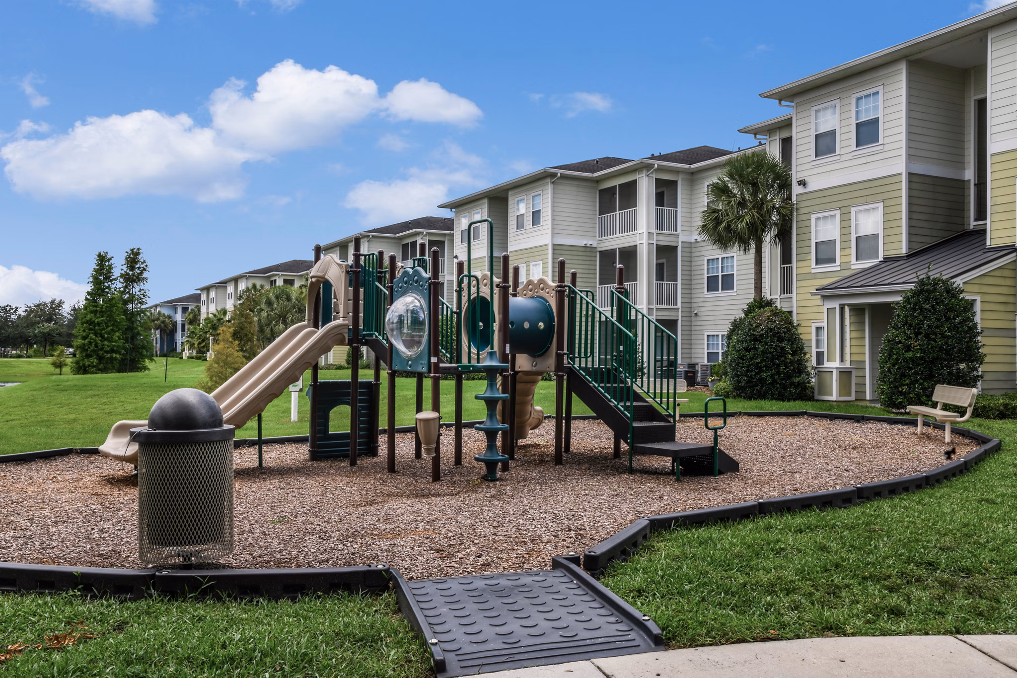 Modern playground at Arbor Glen Apartments offering family-friendly outdoor activities and recreation