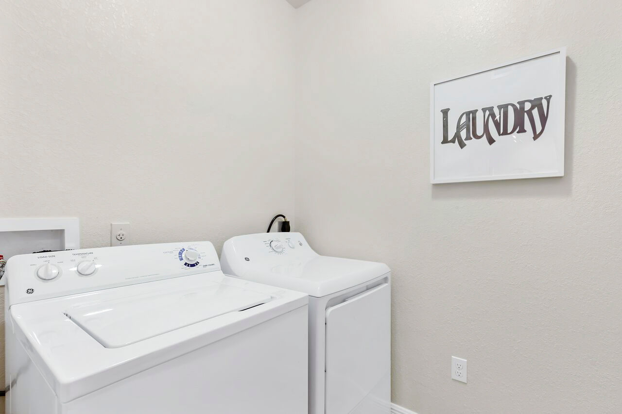 Laundry room at Trinity Club Apartments