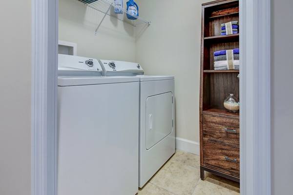 laundry room at Bridges at Kendall Place Apartments        