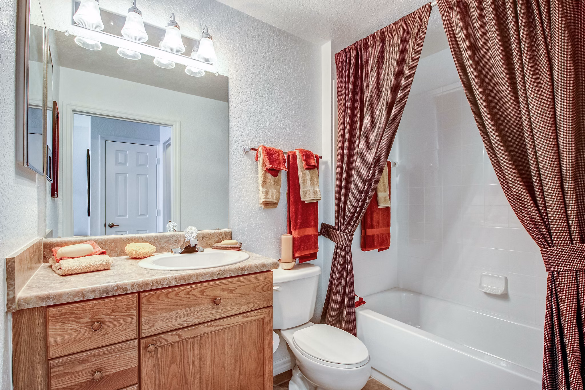 Modern bathroom with sleek fixtures in Hawthorne Village Apartments