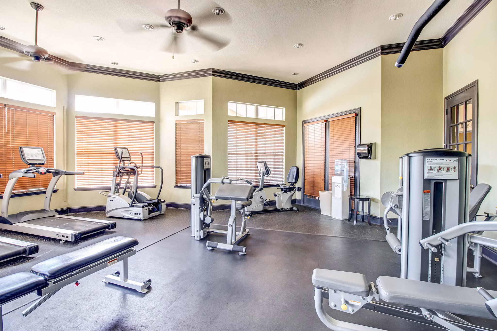 State-of-the-art fitness center with modern equipment at Hawthorne Village Apartments