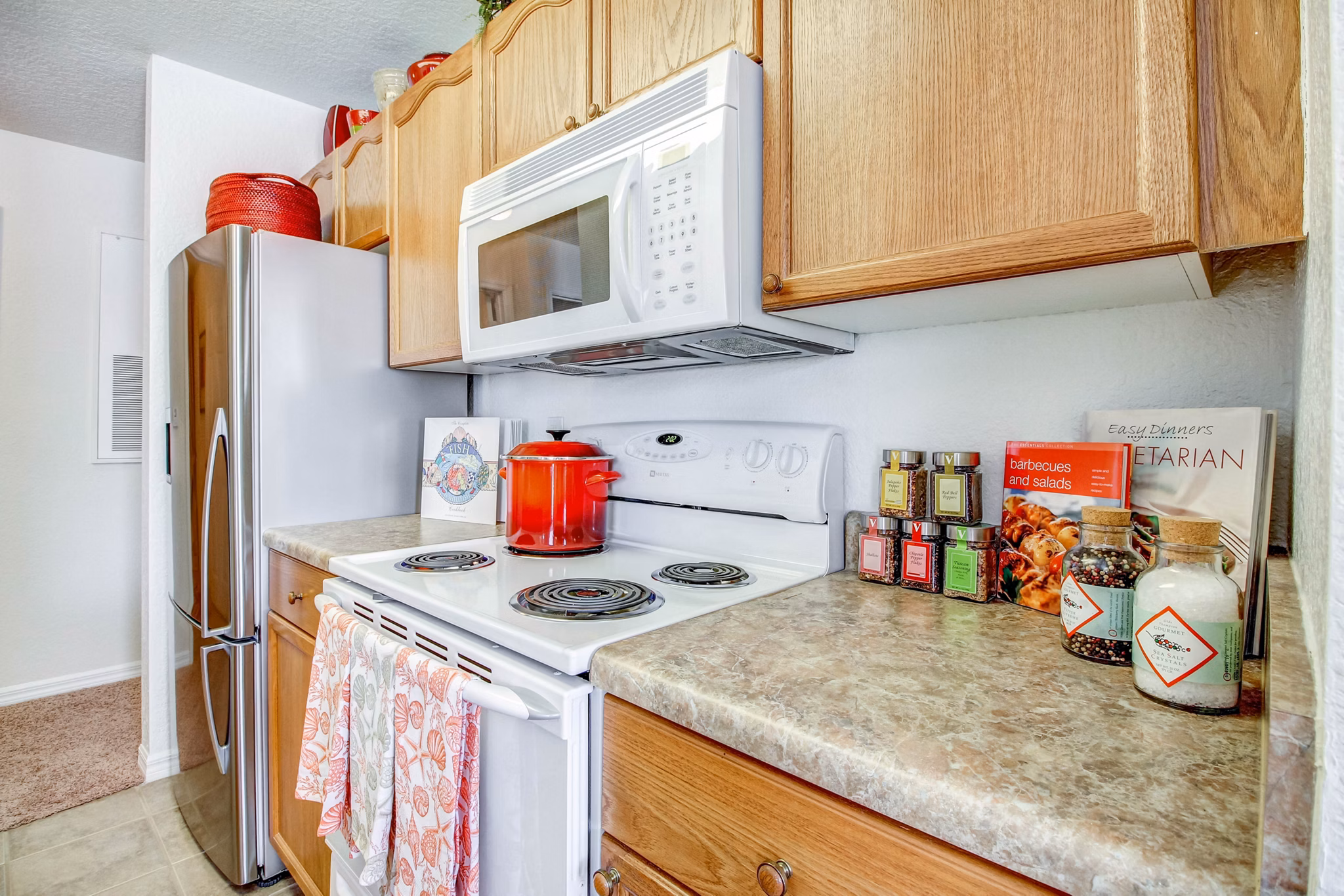 Modern kitchen with stainless steel appliances at Hawthorne Village Apartments