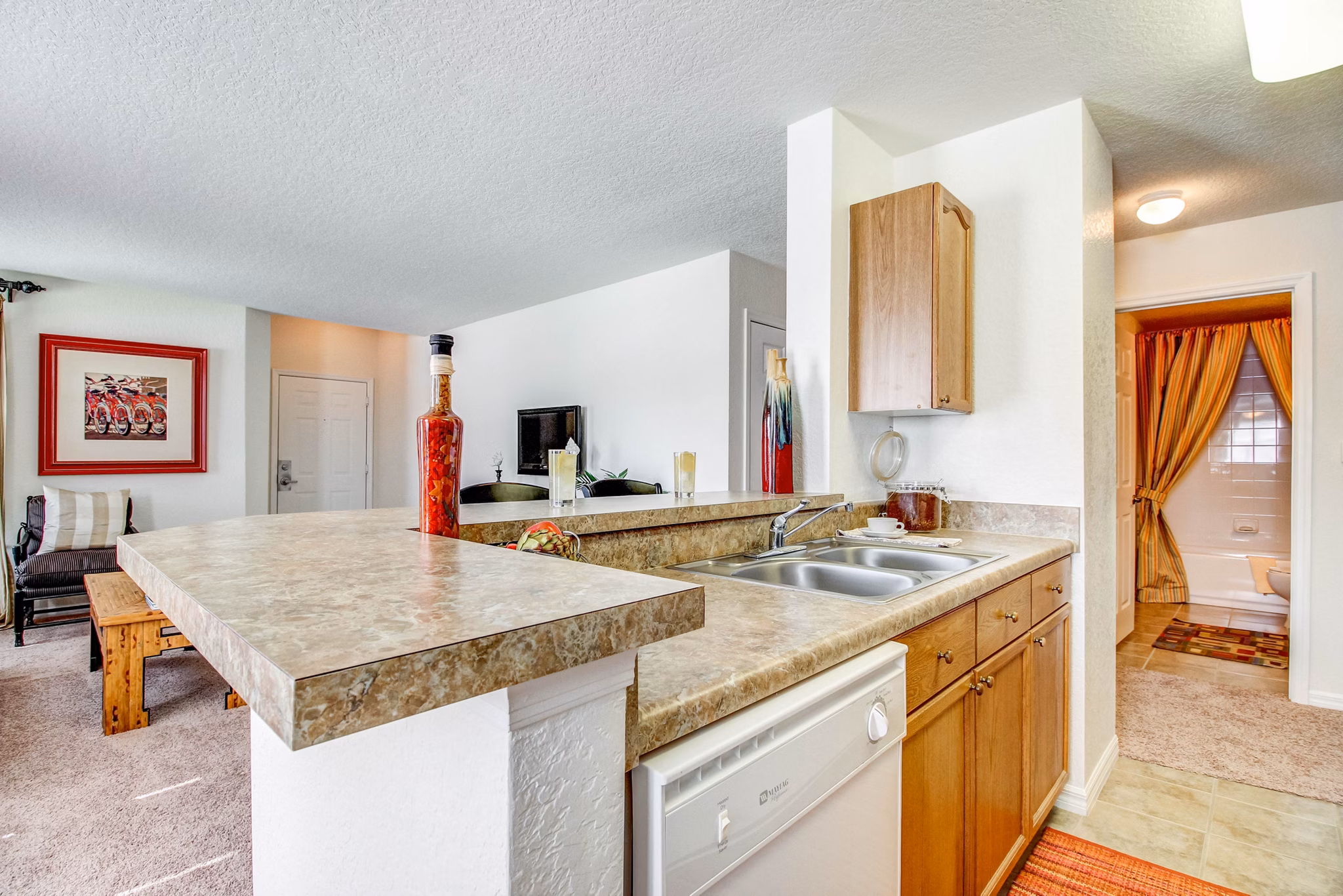Modern kitchen with stainless steel appliances at Hawthorne Village Apartments
