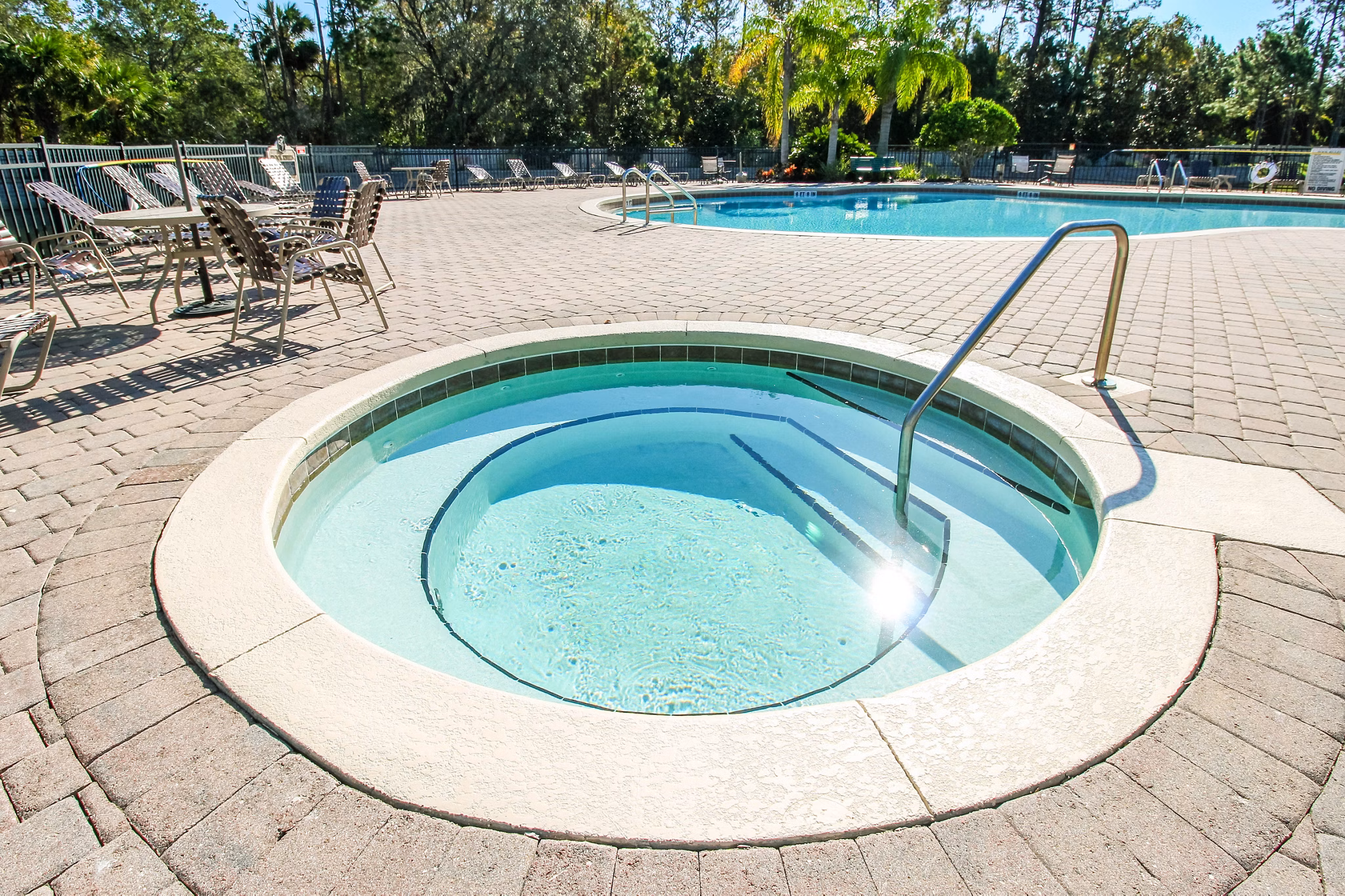 Relaxing hot tub at Hawthorne Village Apartments offering luxurious amenities for residents