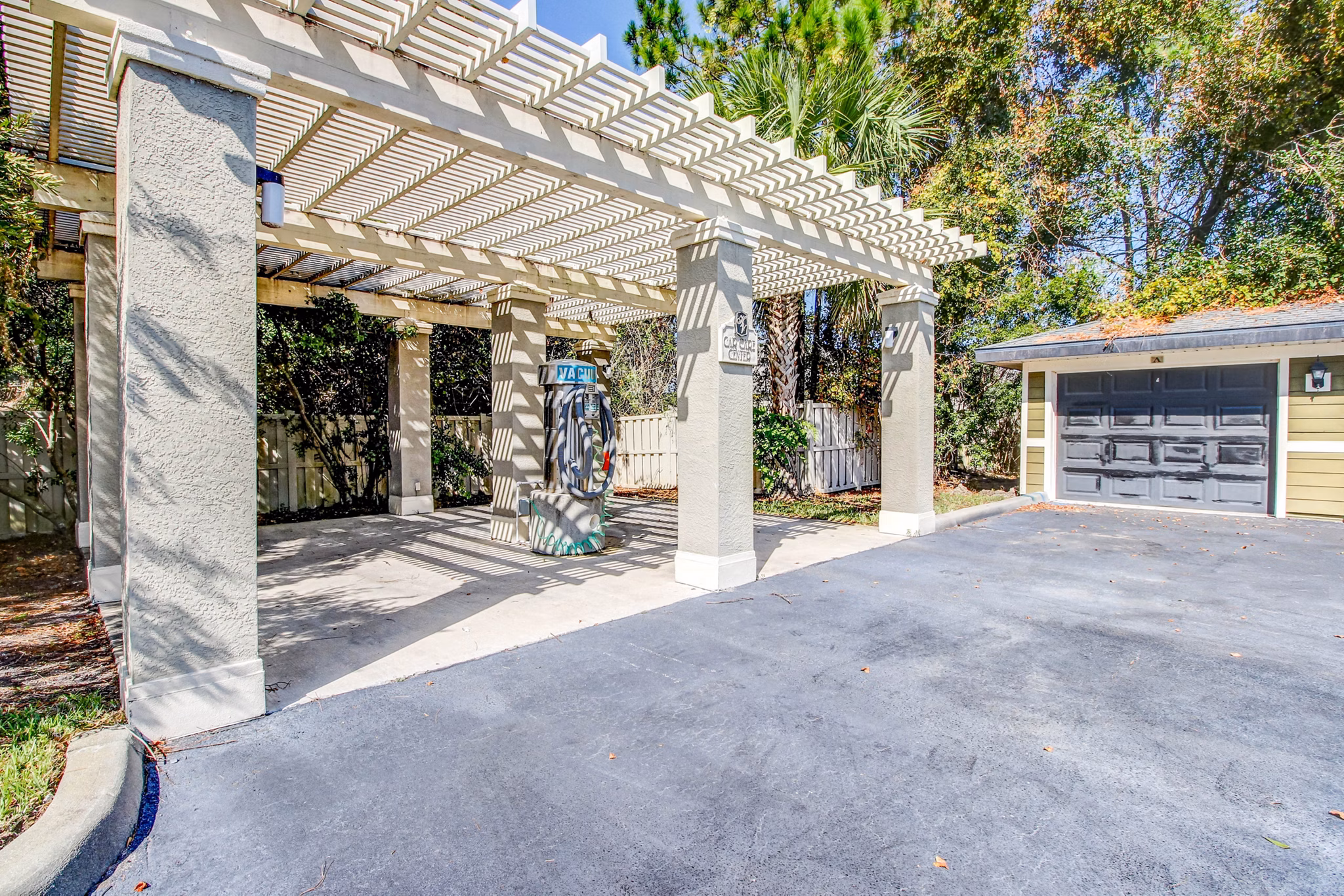 Car care station at Hawthorne Village Apartments offering vehicle maintenance facilities