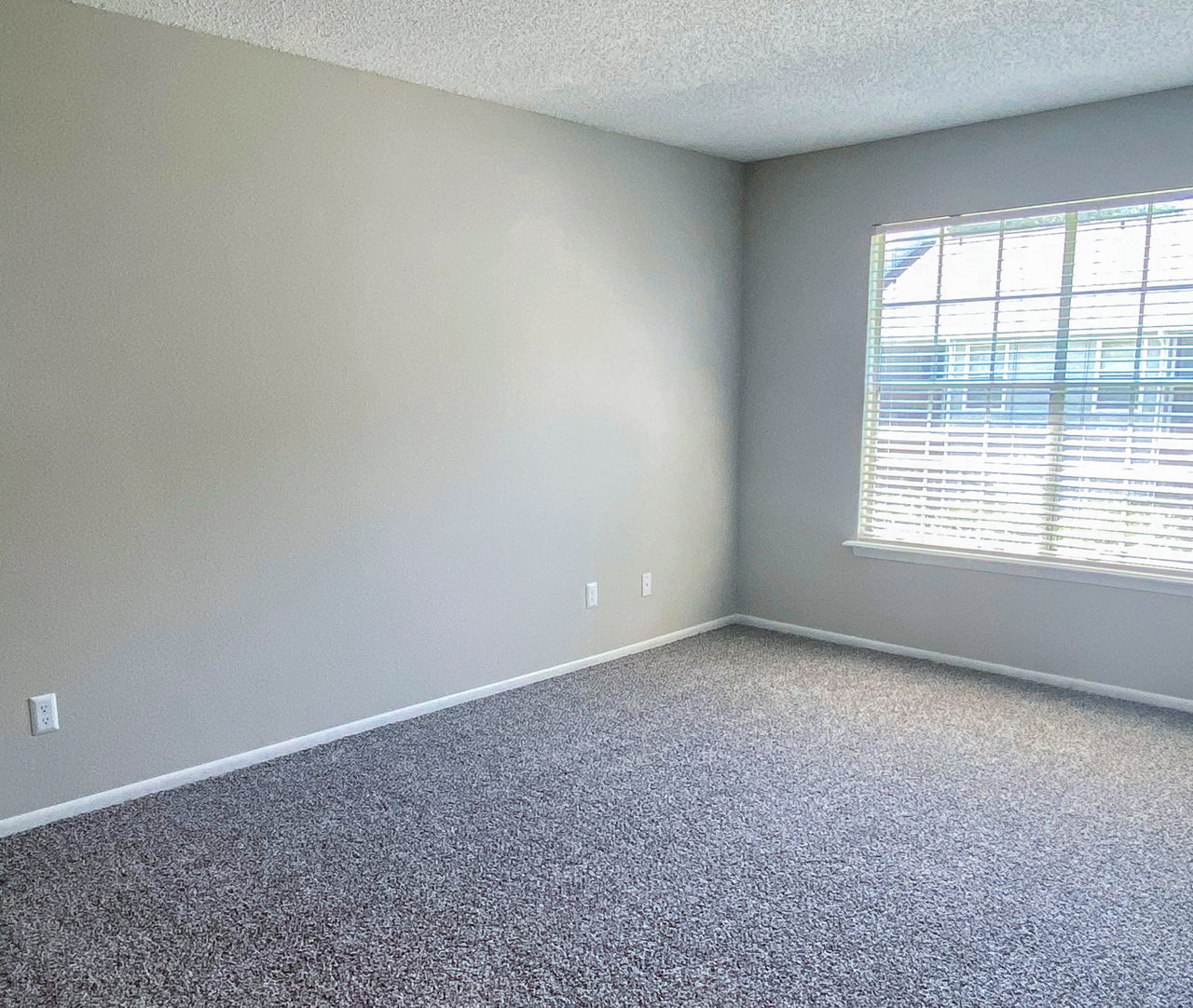 Cozy bedroom with a stylish design at The Crest at Altamonte Apartments