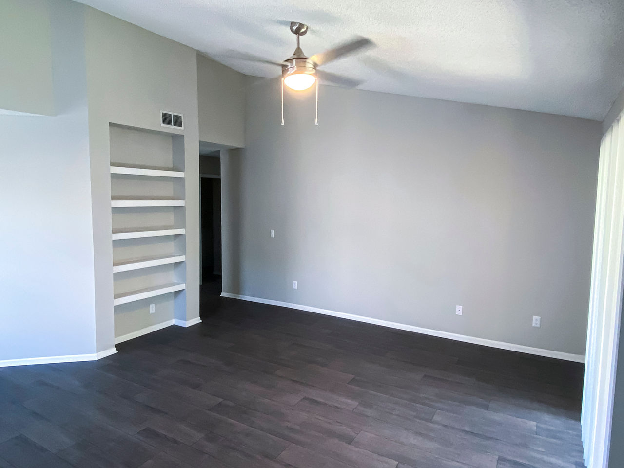 Modern living room with cozy seating and natural light at The Crest at Altamonte Apartments