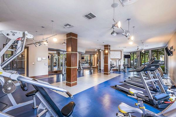 fitness center at The Four at Deerwood Luxury Apartments