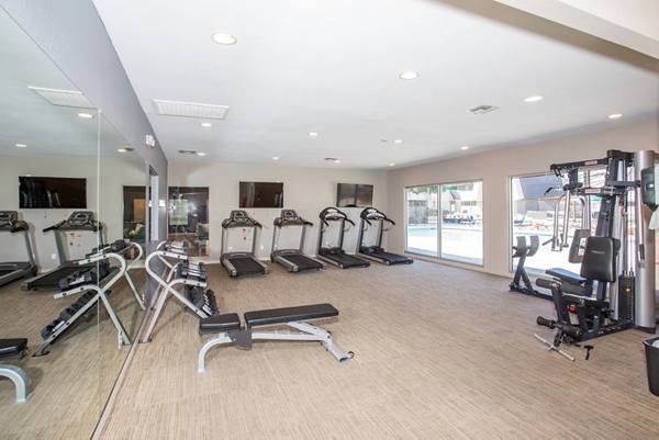 fitness center at Highland Park Apartments