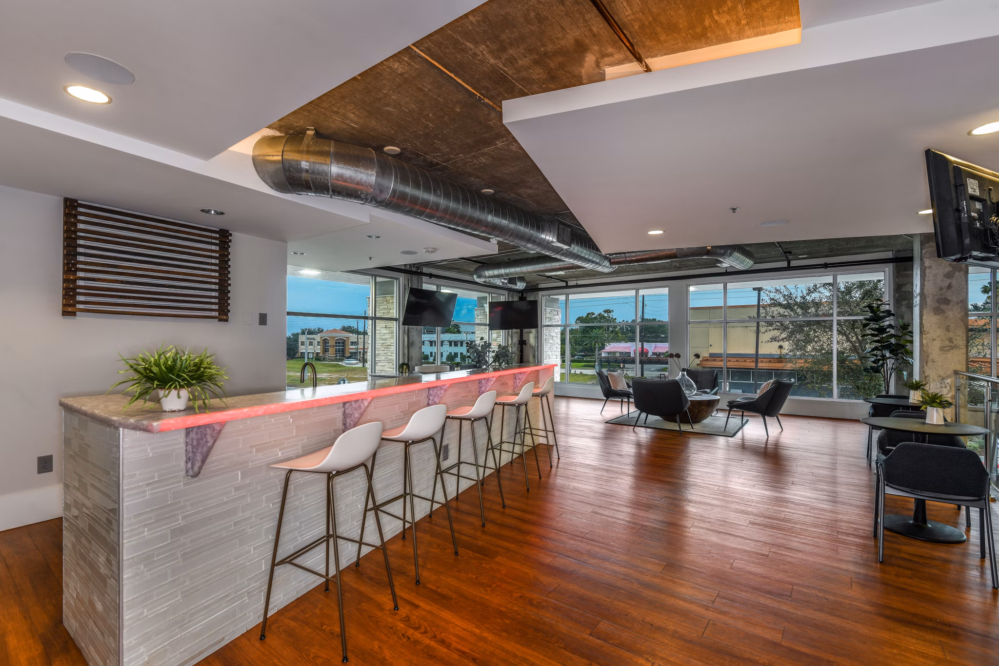 Clubhouse with modern design elements at The Gallery at Mills Park Apartments