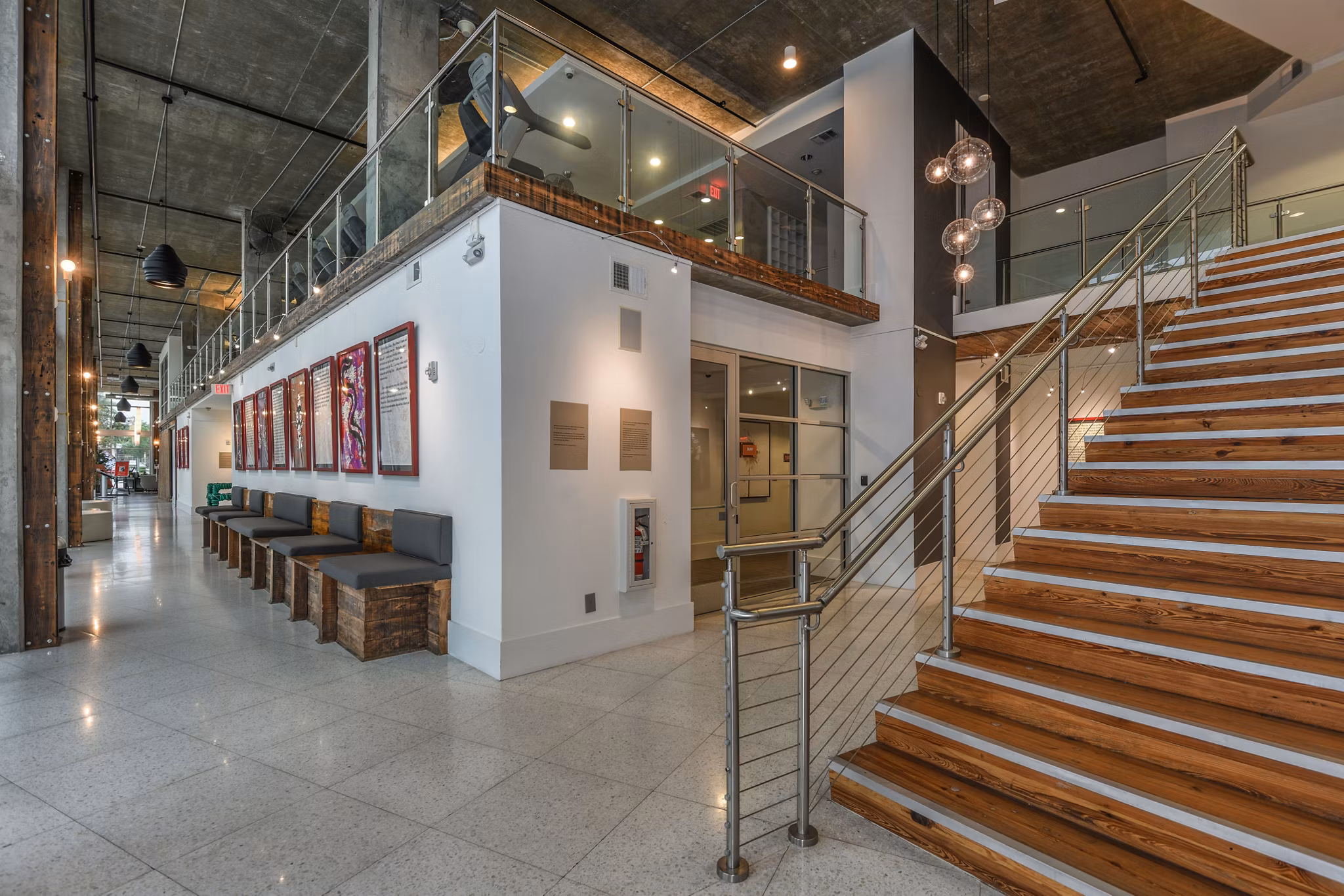 The Gallery at Mills Park: Modern clubhouse with entertainment areas and lounge spaces