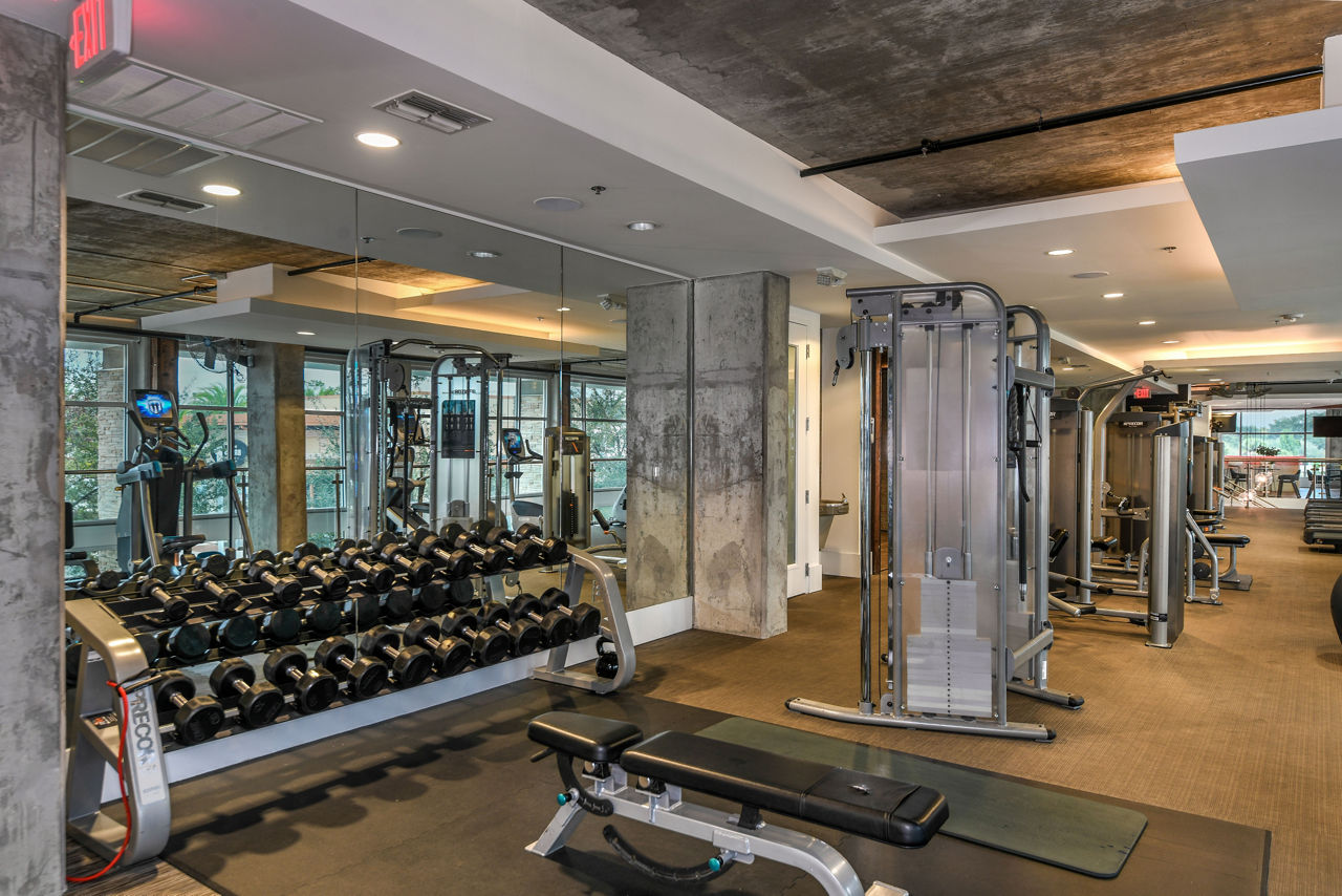 Gym at The Gallery At Mills Park Apartments (5 of 5)