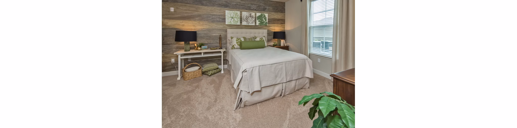 Modern bedroom featuring chic decor and large windows at Trinity Exchange Luxury Apartments