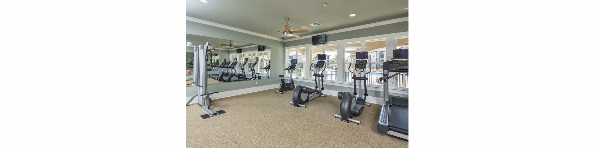 Fitness center with state-of-the-art equipment at Trinity Exchange Luxury Apartments