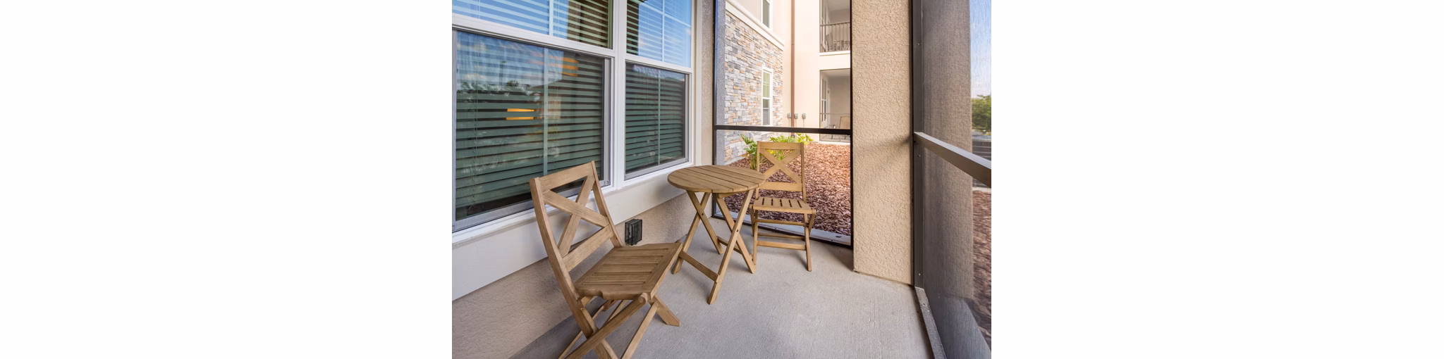 Trinity Exchange: Cozy patio with modern seating at luxury apartments
