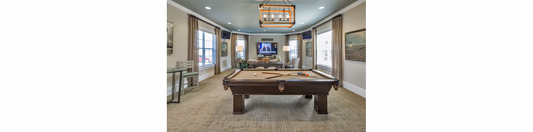 Clubhouse with elegant seating and modern decor at Trinity Exchange Luxury Apartments