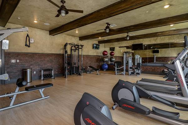 fitness center at The Retreat at Trinity Apartments
