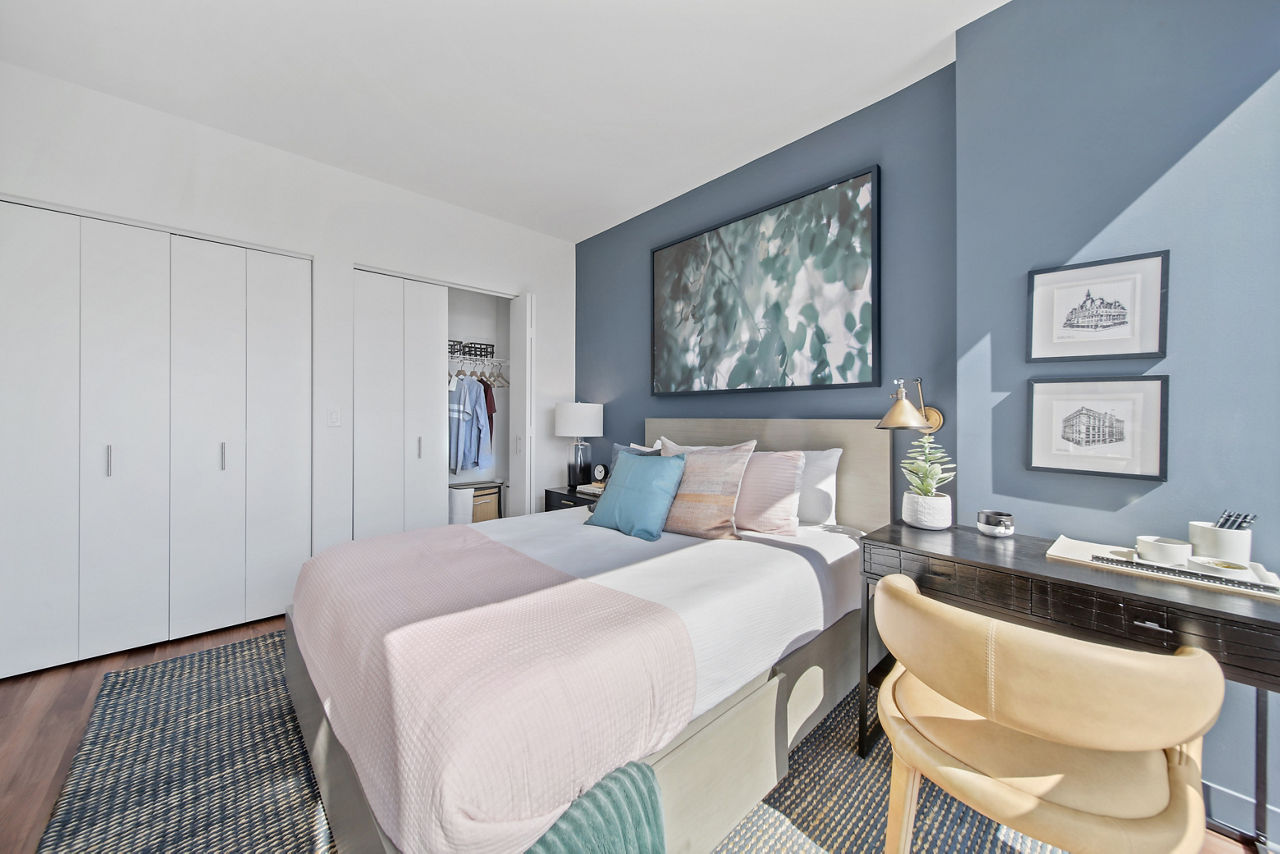 Cozy bedroom featuring modern furnishings at 1225 Old Town Apartments, a luxury residence in the heart of the city