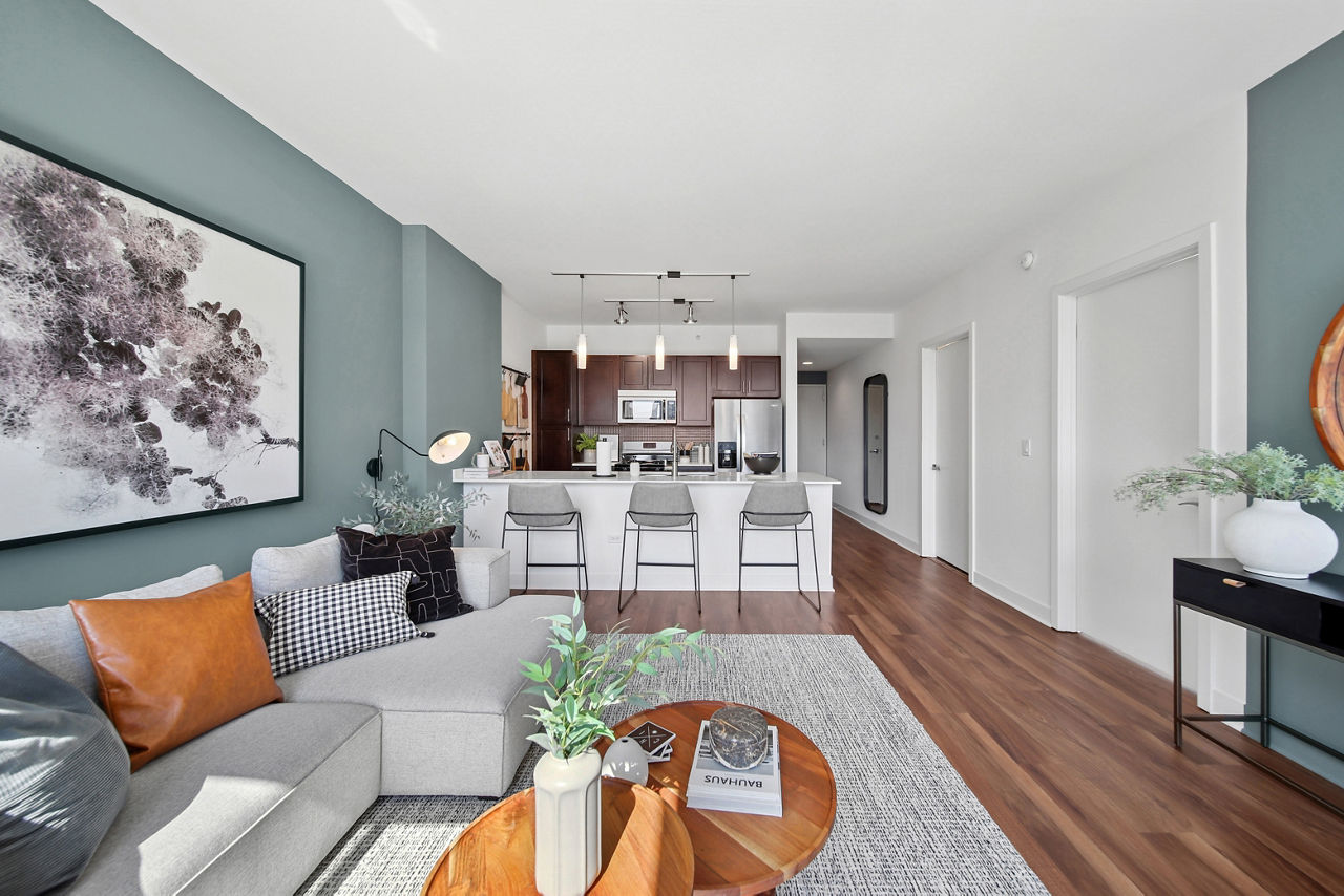 Contemporary living room featuring plush seating and natural light at 1225 Old Town Apartments