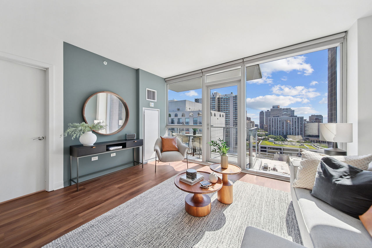 Living room with modern furnishings and natural light at 1225 Old Town Apartments