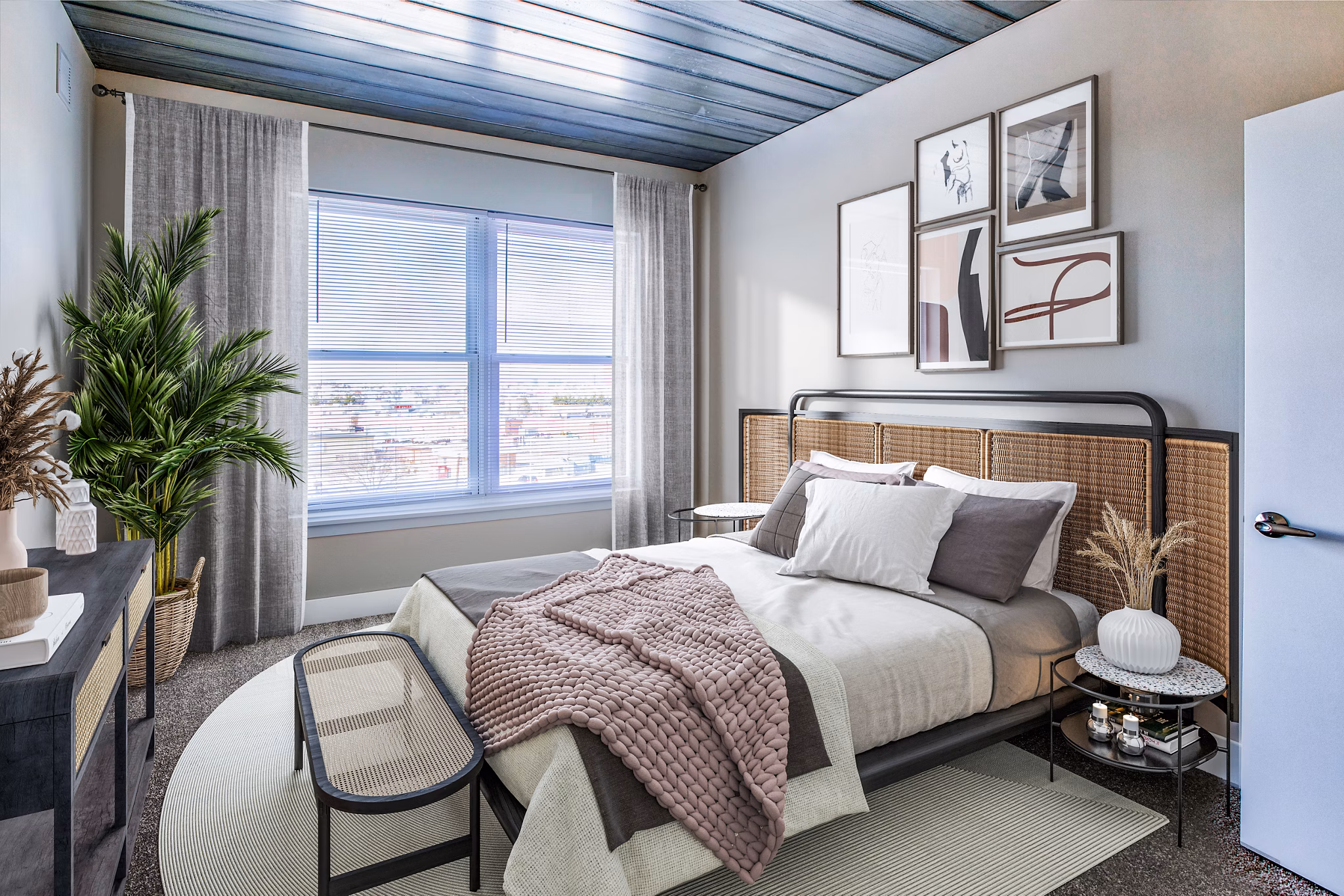 Cozy bedroom with modern decor at McHenry Row Apartments