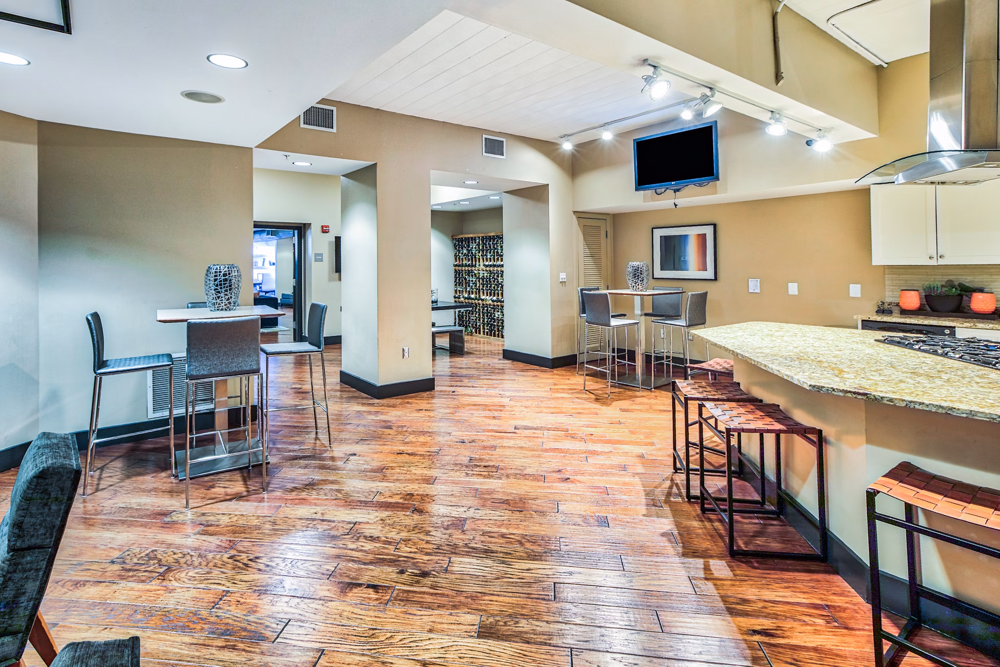 Modern clubhouse kitchen with sleek appliances at McHenry Row Apartments, perfect for entertaining and social gatherings