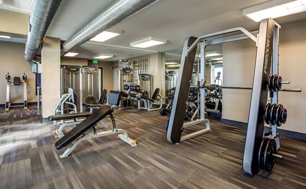 fitness center at McHenry Row Apartments
