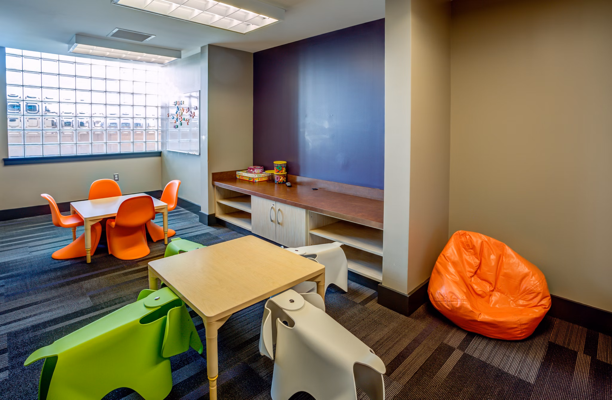 Clubhouse featuring modern decor and cozy seating at McHenry Row Apartments, perfect for social gatherings and community events