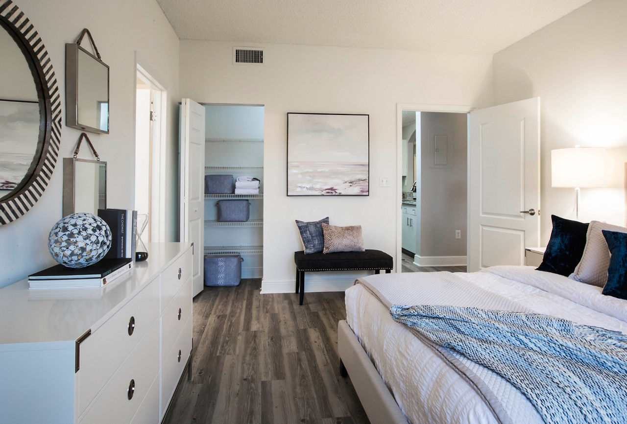 Cozy bedroom with modern decor in Citation Club Apartments