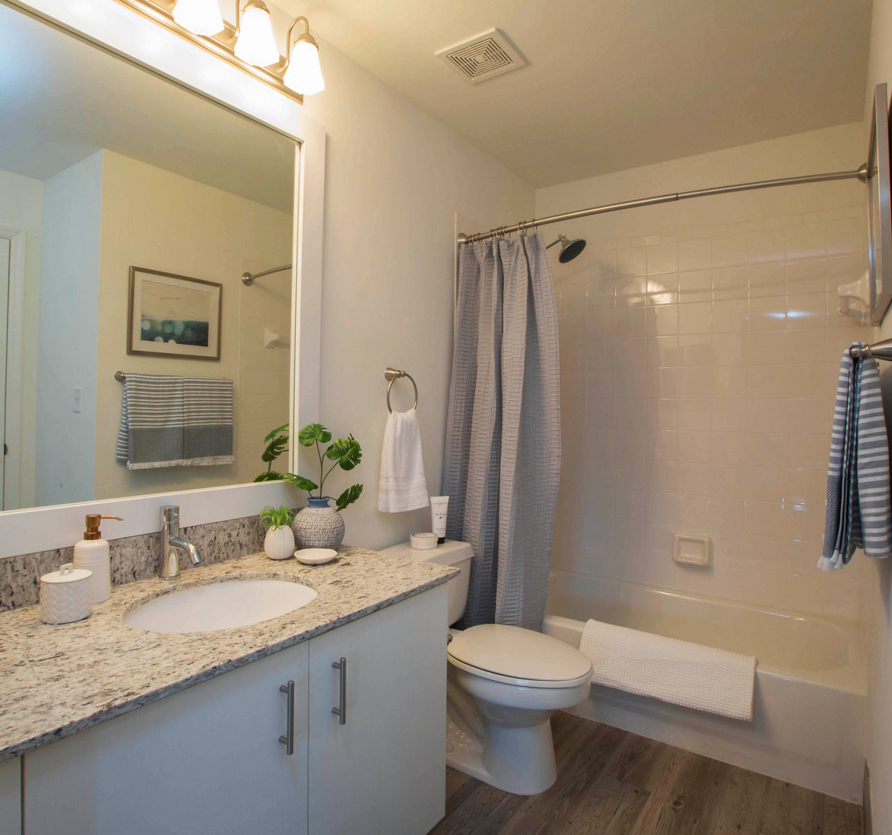 Modern bathroom with marble accents at Citation Club Apartments