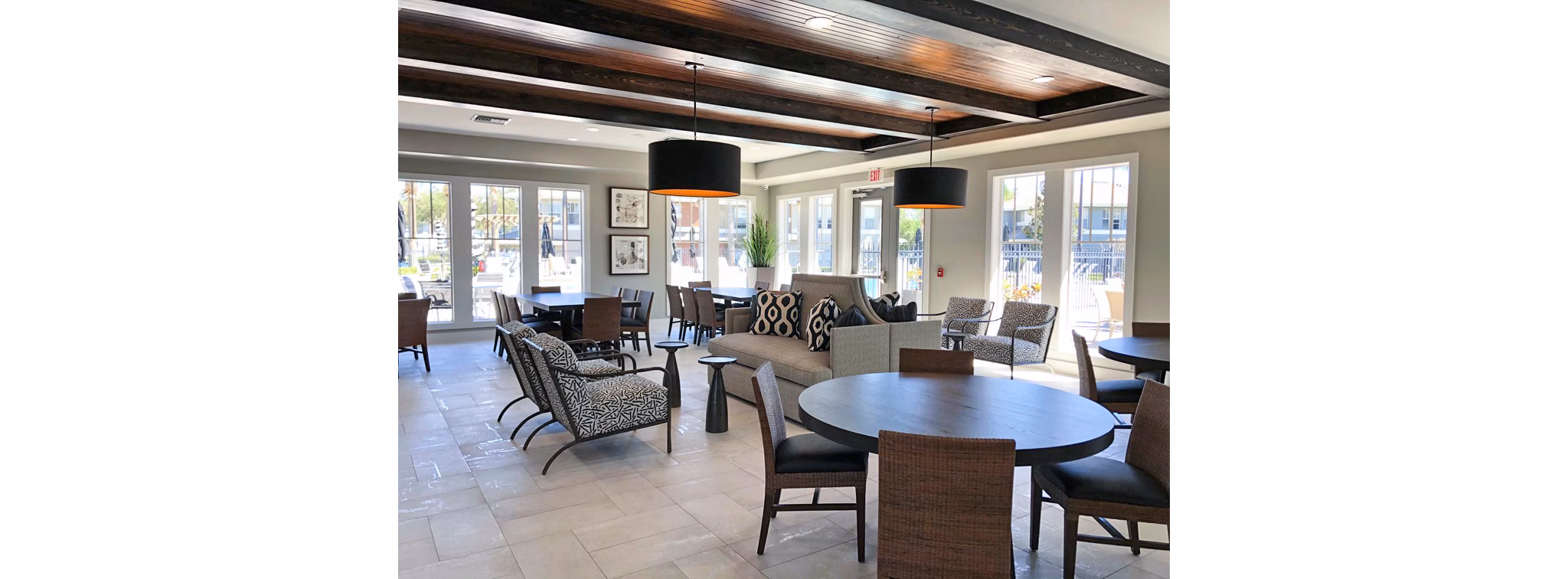 Clubhouse lobby featuring elegant decor and seating at Parks at Hunter's Creek Apartments, showcasing luxury living spaces