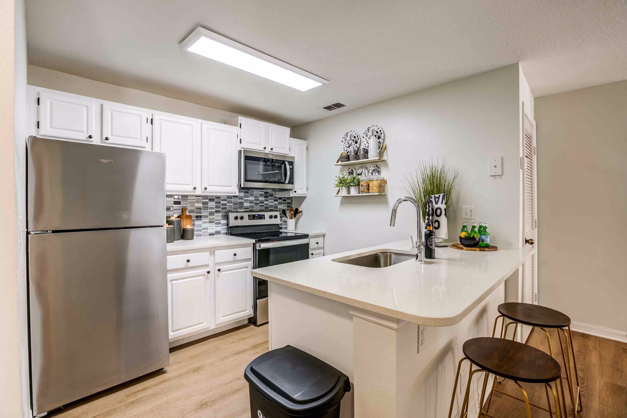 Modern kitchen with stainless steel appliances at Parks at Hunter's Creek Apartments Perfect for luxury living and entertaining