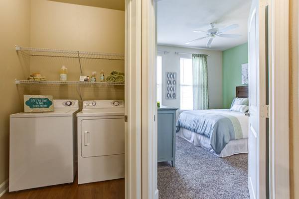 laundry room at Town Center at Lakeside Village Apartments
