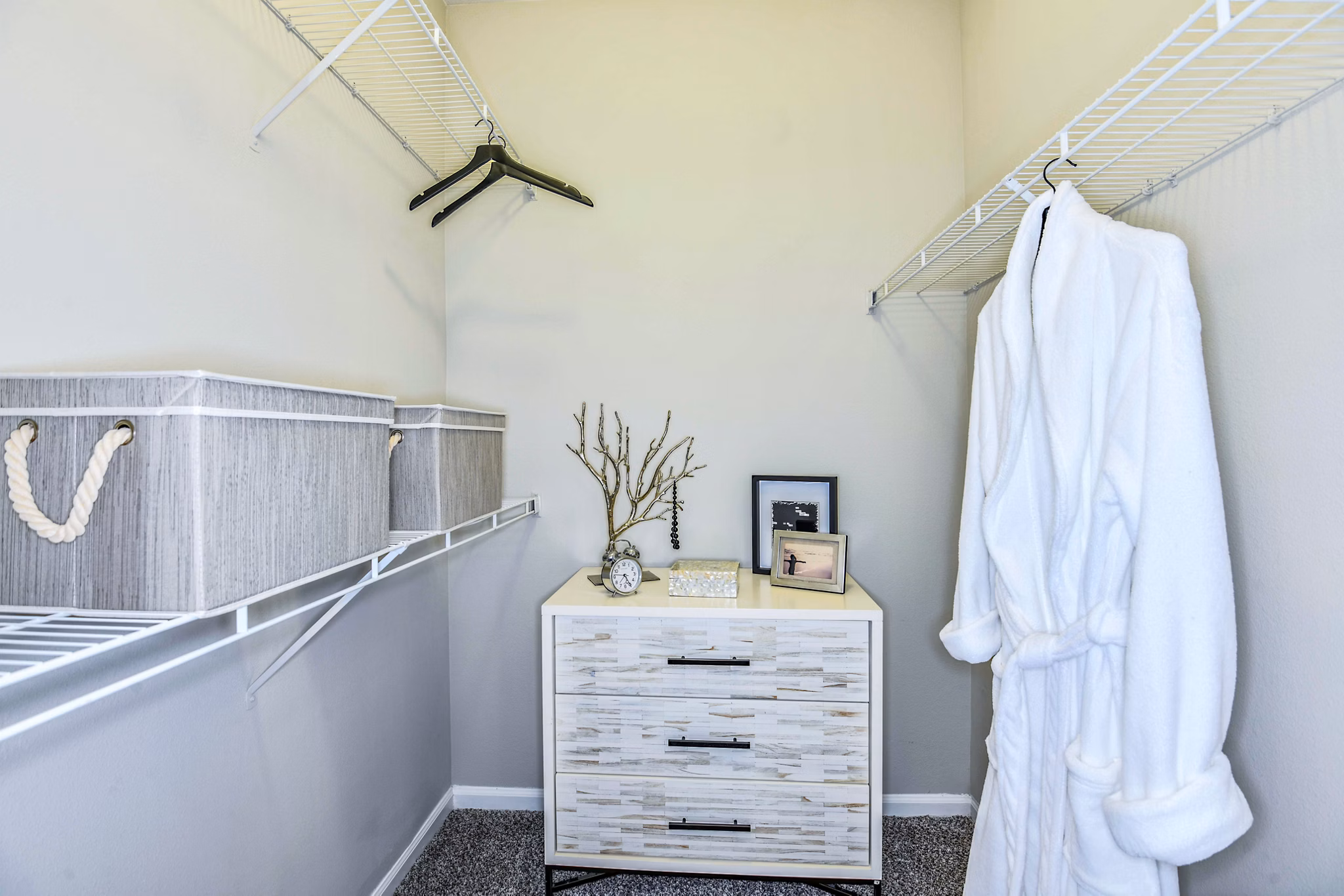 Bedroom closet with custom shelving and ample storage space at 54 Magnolia Apartments, a Greystar luxury community