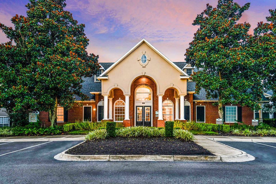 Clubhouse featuring modern design and comfortable seating at 54 Magnolia Apartments
