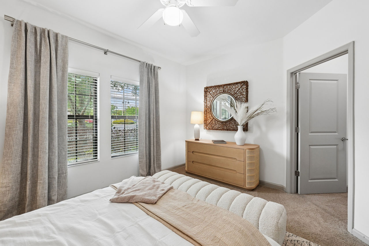 Cozy bedroom with elegant decor at Sanctuary at Eagle Creek Apartments
