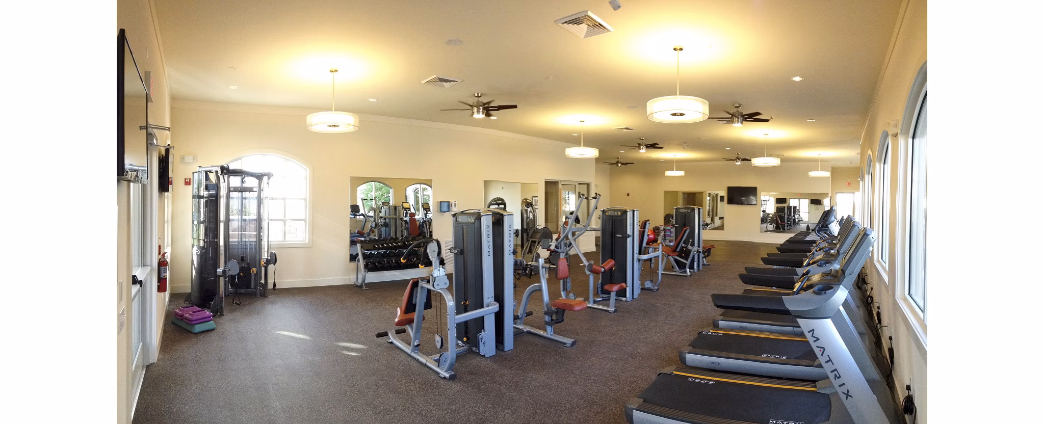 Modern fitness center with state-of-the-art equipment at Sanctuary at Eagle Creek Apartments