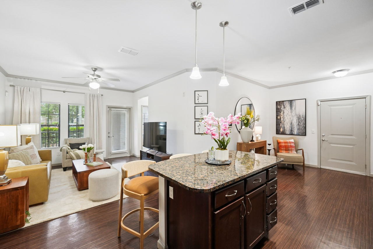 Spacious living room with contemporary decor in Sanctuary at Eagle Creek Apartments