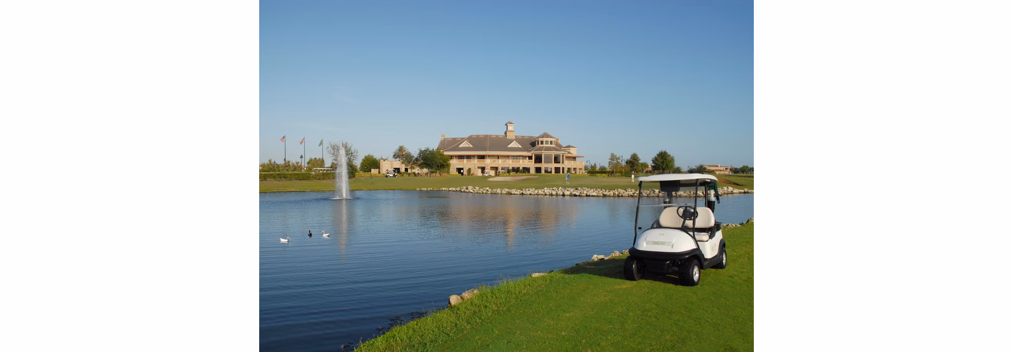 Sanctuary at Eagle Creek: Scenic view of luxury apartments surrounded by lush greenery